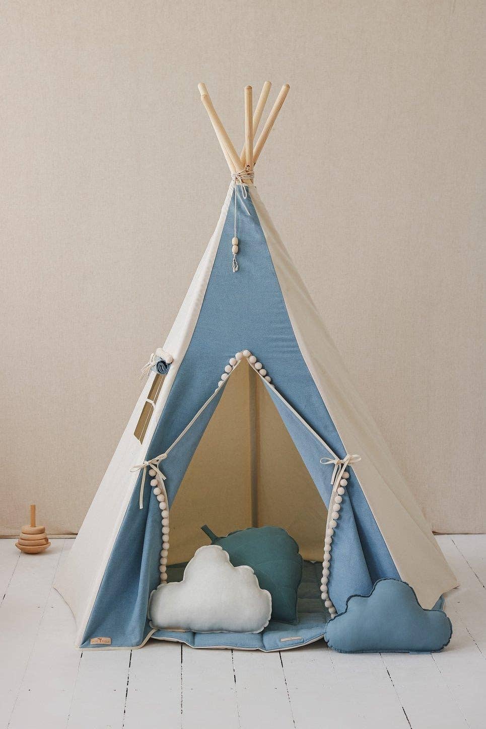 Jeans tipi-tent met pompons